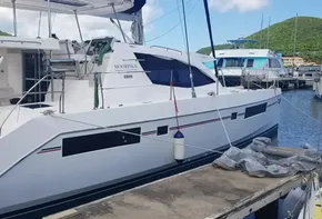 2017 Leopard 48 catamaran docked at a marina.