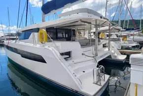 2020 Leopard 50 catamaran docked at marina, featuring sleek design and spacious deck.