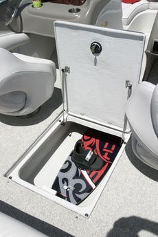 Crownline Bowrider 210 LS - Lockable in-floor wakeboard storage compartment with stainless steel shocks.