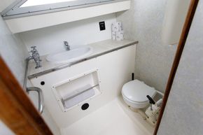 Forward toilet and shower