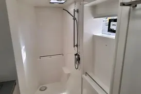 Modern shower area in a 2021 Leopard 50 yacht, featuring sleek design and fixtures.