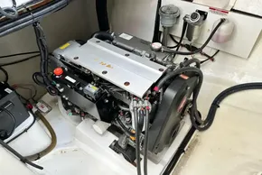 Engine room of a 2021 Leopard 50 yacht, showcasing a well-maintained engine system.