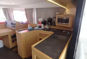 Modern kitchen area inside a 2020 Lagoon 42 catamaran yacht.