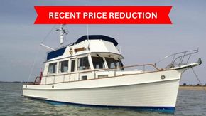 1991 Grand Banks 36 Sedan boat with recent price reduction banner.