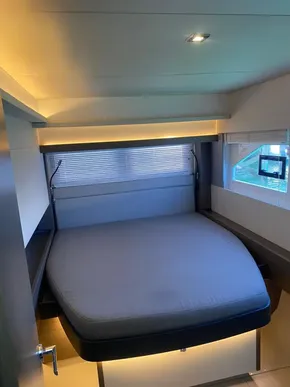 Interior of 2021 Leopard 53 Powercat featuring a cozy bed.