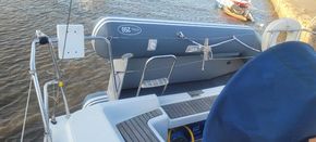 dinghy stored on transom davits