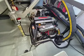 Engine room of a 2020 Leopard 45 yacht with Yanmar engine and hoses.