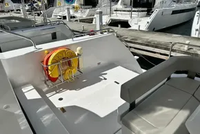 2025 Robertson and Caine Leopard 46 Powercat deck with seating and life preserver.