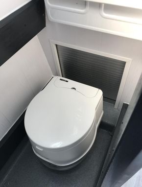 Porta Potti Toilet & access to rear deck so that it can be pushed out of the way if needed