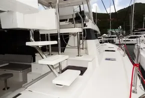 Modern Leopard 50 yacht, 2020 model, docked at marina with sleek white design.