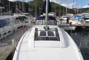 Beneteau Oceanis 46.1 2020 sailboat docked at marina with solar panels on deck.