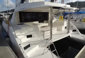 2017 Leopard 43 Powercat docked, rear view showing spacious deck and seating area.