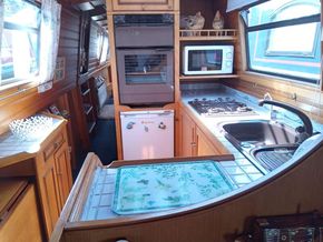 Galley and walkway to bedroom from saloon