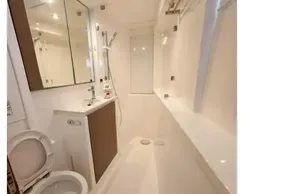 Modern yacht bathroom interior in a 2021 Leopard 50, featuring sleek design and fixtures.