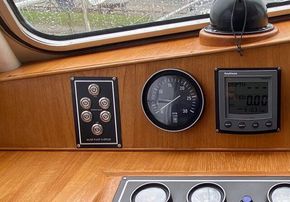 Tridata display (rt), Port engine rev counter (mid), bilge pump over-ride switches (left), Sestrel compass (top)