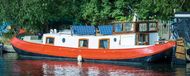 Dutch barge with mooring in Springfield marina L 