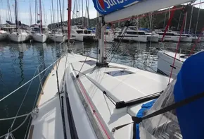 2017 Jeanneau Sun Odyssey 389 sailboat docked in a marina.