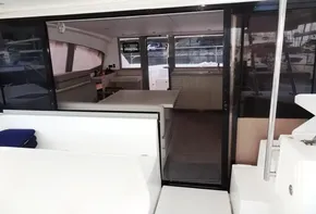 Interior view of 2018 Leopard 43 Powercat yacht with spacious seating area.