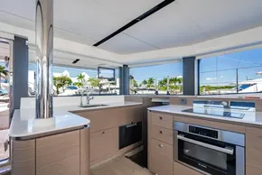 Modern kitchen interior on 2025 Leopard 46 yacht, featuring sleek design and appliances.