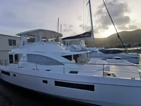 2017 Leopard 51 Powercat yacht docked at marina during sunset.