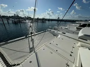 Leopard 50 catamaran deck with marina view, sunny day, 2020 model.