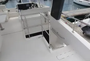 Leopard 43 Powercat 2020 model boat deck with helm station and marina view.