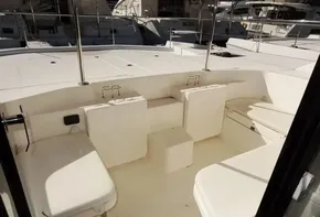 2015 Leopard 51 Powercat boat deck with seating area and stainless steel railings.
