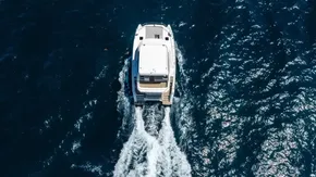 2025 Leopard 40 Powercat cruising on open sea, aerial view.