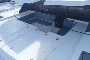 2022 Leopard 45 yacht deck with seating area and storage compartments.