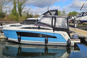 2023 Balt 818 Titanium boat docked, featuring a sleek blue and white design.