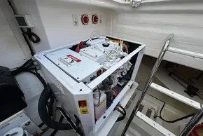 Engine compartment of 2024 Leopard 40 Powercat, showcasing generator and wiring details.