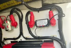 Sterling Power Products charger in Leopard 45, 2019 model, with wiring and connectors.