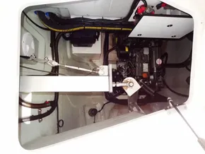 Engine compartment of a 2021 Leopard 40 catamaran, showcasing mechanical components and wiring.