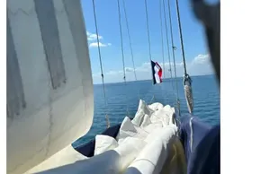 Sailboat view with sails and ocean, Leopard 42 model, 2022.
