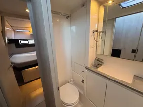 Modern bathroom and bedroom interior on a 2019 Leopard 40 yacht.