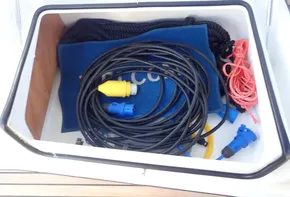 Storage compartment with ropes and cables on 2019 Jeanneau Sun Odyssey 440 yacht.