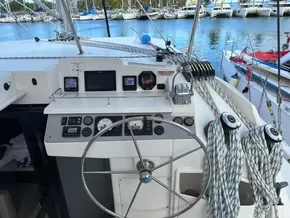 2019 Leopard 40 yacht helm with navigation instruments and marina view.