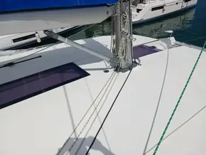 2019 Leopard 45 catamaran deck with rigging and blue sail cover.
