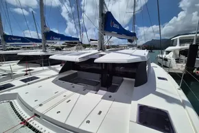 2021 Leopard 45 catamaran docked, featuring spacious deck and Sunsail branding.