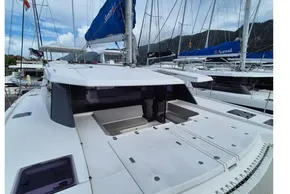 2020 Leopard 45 catamaran docked, showcasing spacious deck and modern design.