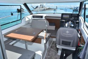 Jeanneau Merry Fisher 695 - wheelhouse with forward seating, port side saloon and starboard side galley