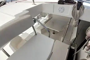 Interior view of 2018 Leopard 45 catamaran cockpit with seating and table.