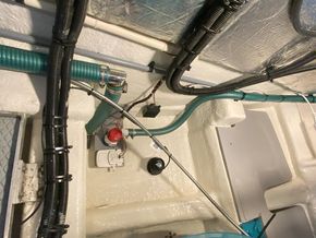 Bilge pumps - sender for high bilge water alarm (centre), stbd bilge, engine room, fwd. Also visible, just aft of this, Raymarine speed/temperature transducer