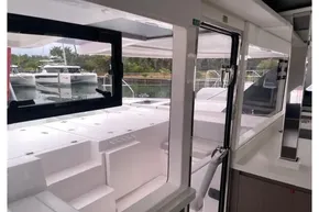 Interior view of 2022 Leopard 45 catamaran, showcasing sleek design and spacious layout.