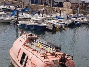 Lifeboat ex Oil-rig,  converted.