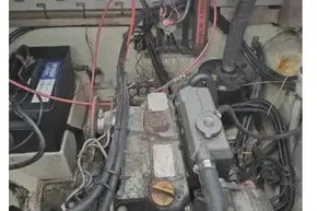 Engine compartment of a 2008 Leopard 38 with visible wiring and components.