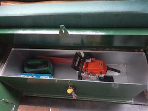 Stern Chainsaw hanger and accessories locker