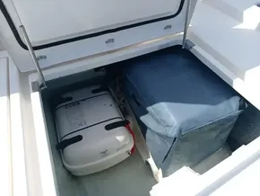 Storage compartment on a 2019 Leopard 45 yacht with luggage and equipment.