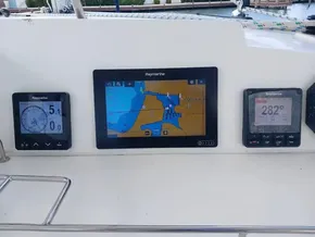 Navigation instruments on a 2021 Leopard 40 catamaran, featuring Raymarine displays.