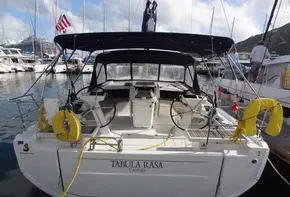 2020 Beneteau Oceanis 46.1 sailboat docked at marina, rear view.